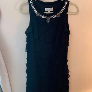 Classy black ruffled dress with pearl neckline